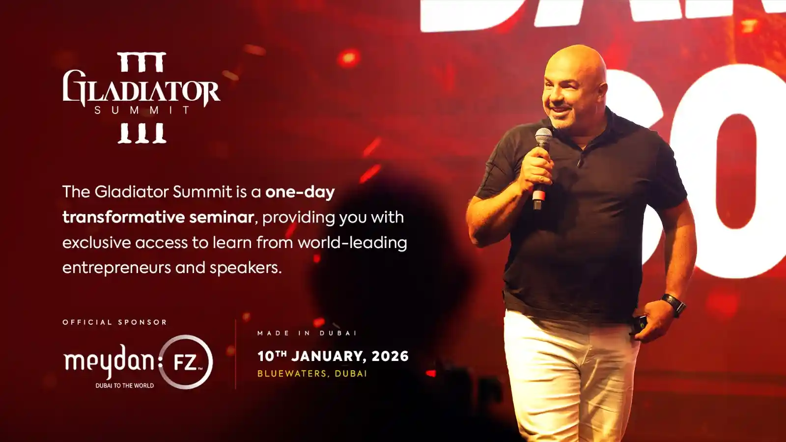 Dariush Soudi is presenting on stage at Gladiator Summit, a high-energy leadership and business seminar featuring global entrepreneurs